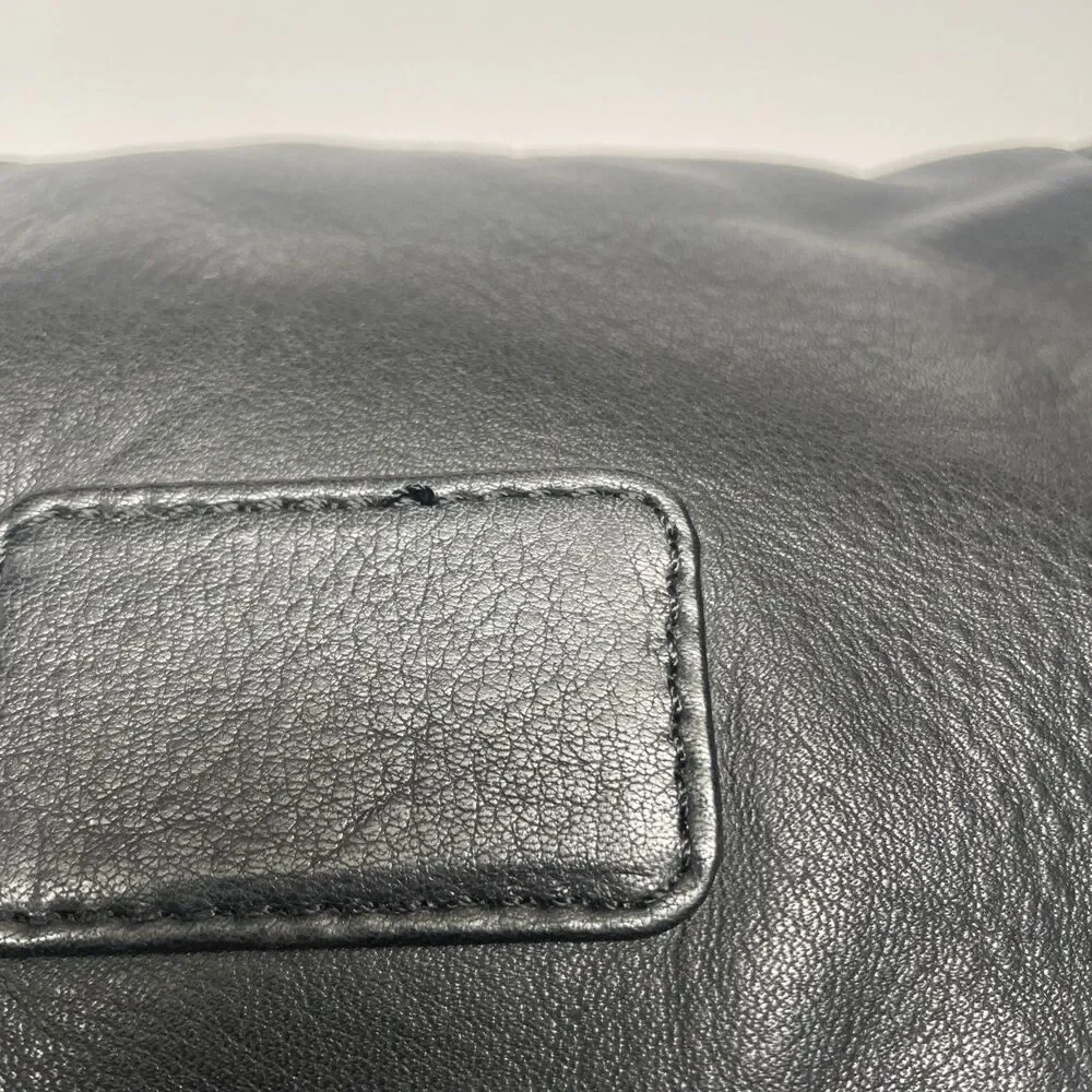 Tumi black leather